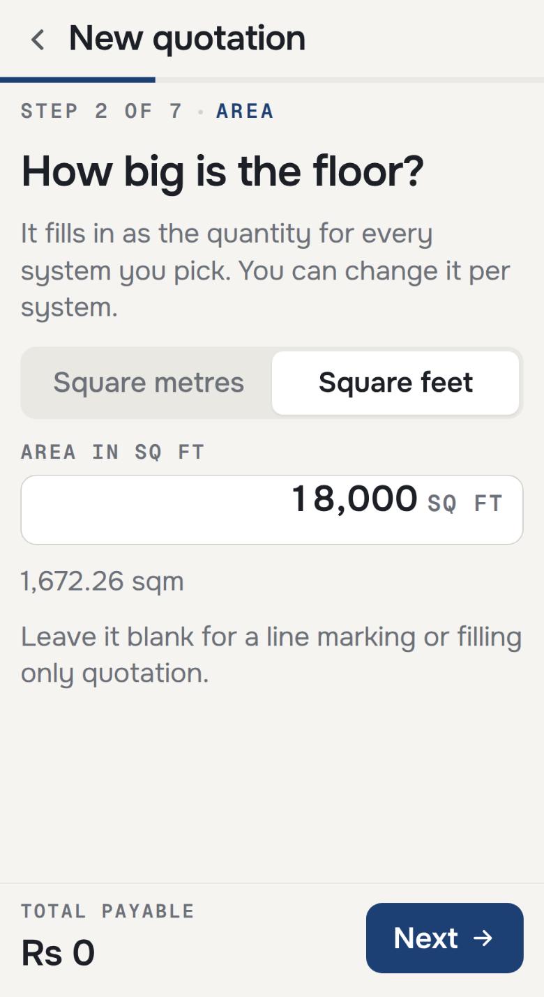 The area step of a quotation, with square feet chosen, eighteen thousand square feet entered, and the same figure in square metres under the field.